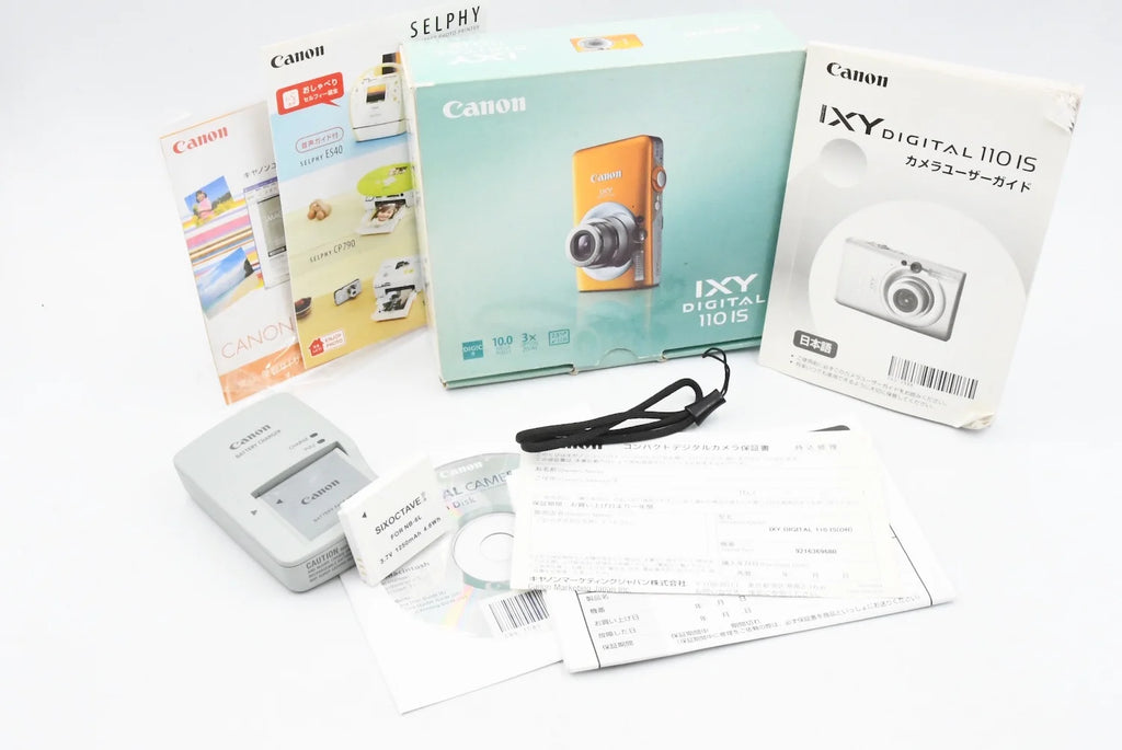 Canon IXY DIGITAL 110IS ORANGE SN. 9216369680