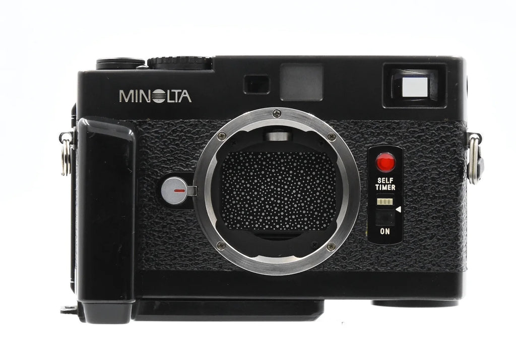 MINOLTA CLE + GRIP SN. 1011054