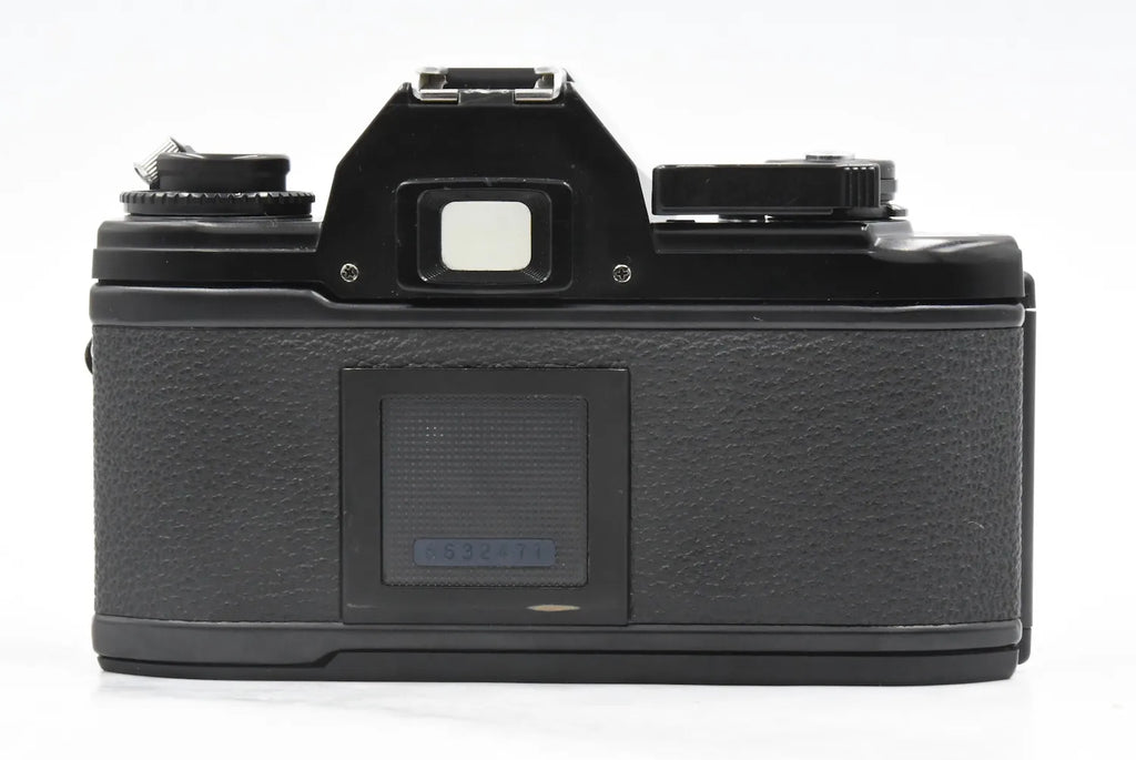 Nikon EM + Ai-S 50mm F1.8 SN. 6632471