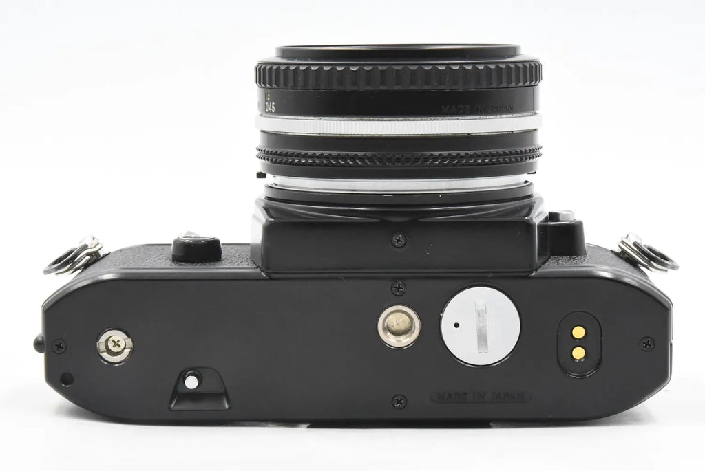 Nikon EM + Ai-S 50mm F1.8 SN. 6632471