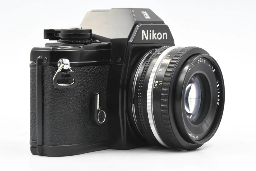 Nikon EM + Ai-S 50mm F1.8 SN. 6632471