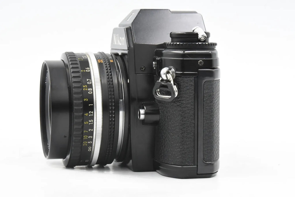 Nikon EM + Ai-S 50mm F1.8 SN. 6632471